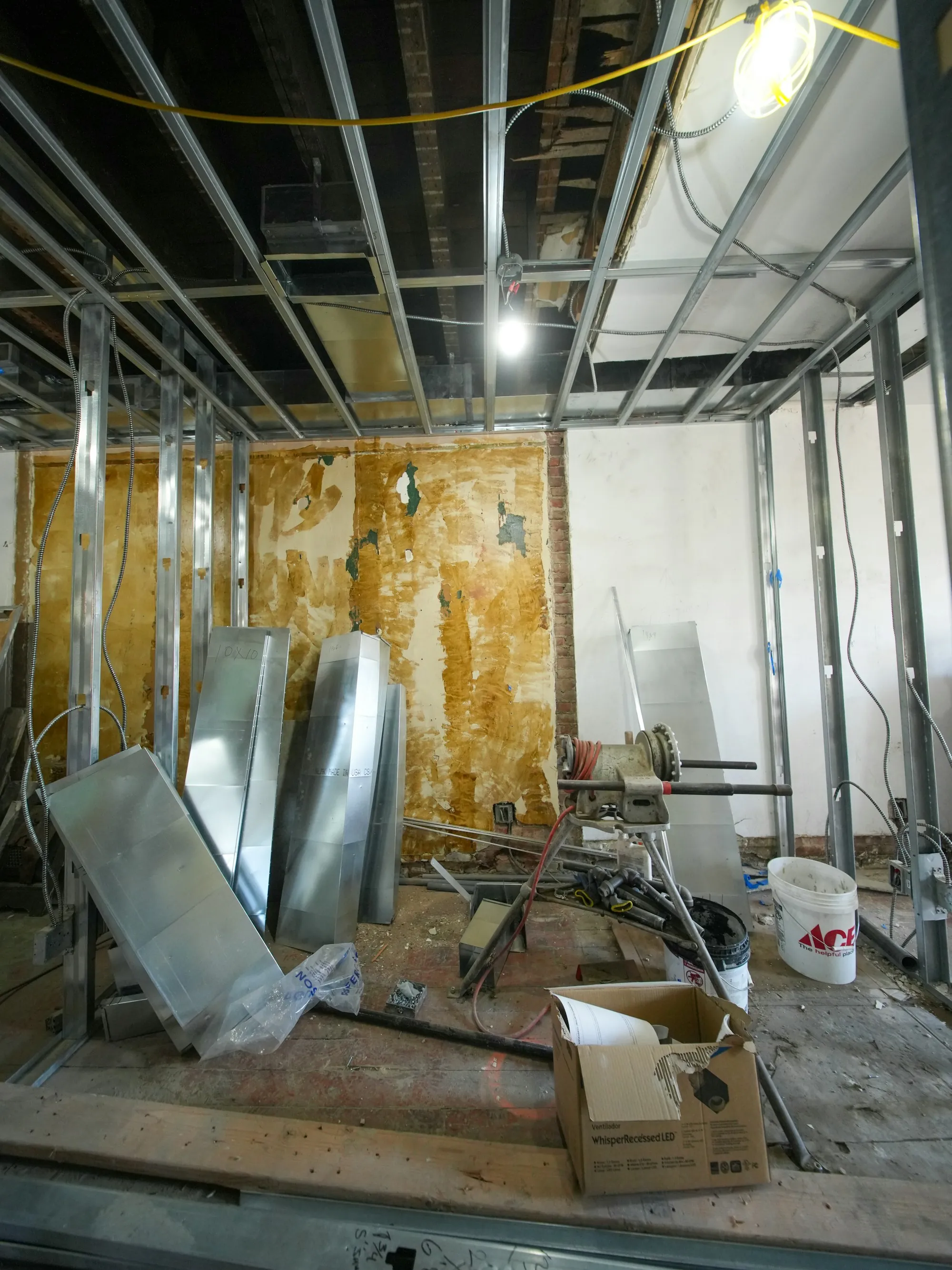 Interior with wall panels removed during renovation